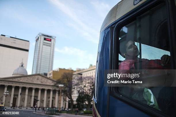 Man sleeps on a bus on November 21, 2015 in Buenos Aires, Argentina. Argentina is facing its first presidential election runoff in the history of the...