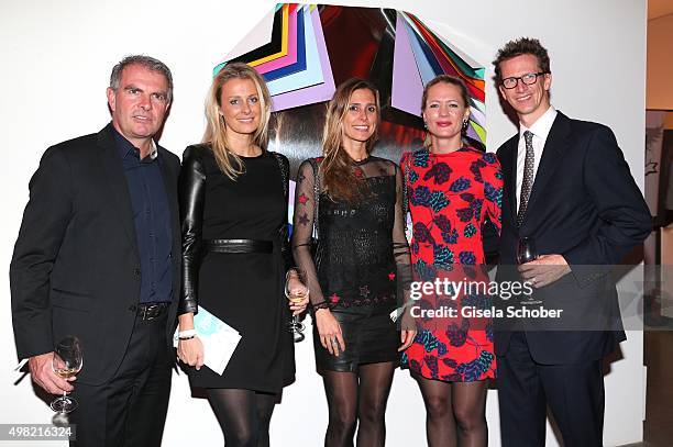 Carsten Spohr and his wife Vivian Spohr, Conny Lehmann, Princess Anna von Bayern and her husband Prince Manuel von Bayern in front an artwork of Jim...