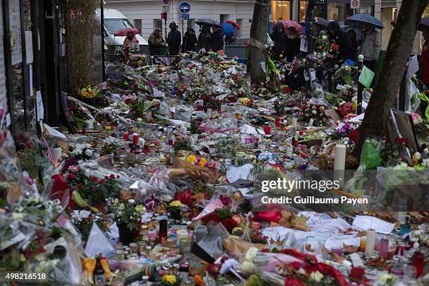 Flowers, candles and messages left as a memorial in "La Belle Equipe" restaurant in the 11th district of Paris, following a series of coordinated...