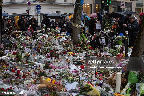 Flowers, candles and messages left as a memorial in "La Belle Equipe" restaurant in the 11th district of Paris, following a series of coordinated...