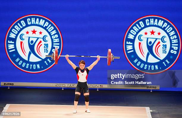 Hiromi Miyake of Japan competes in the women's 48kg weight class during the 2015 International Weightlifting Federation World Championships at the...