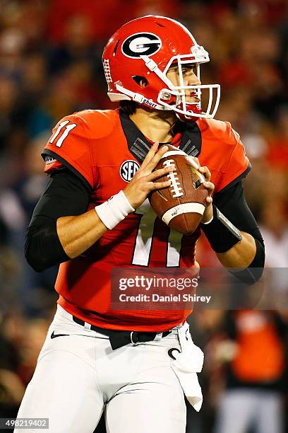 Greyson Lambert of the Georgia Bulldogs throws a pass during the first half against the Georgia Southern Eagles at Sanford Stadium on November 21,...