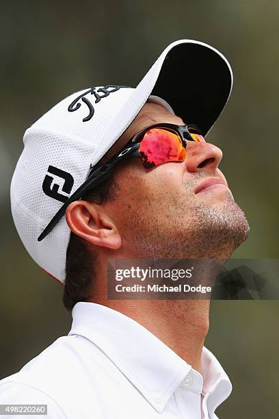 Adam Scott of Australia reacts after missing a putt during the final round of the 2015 Australian Masters at Huntingdale Golf Club on November 22,...