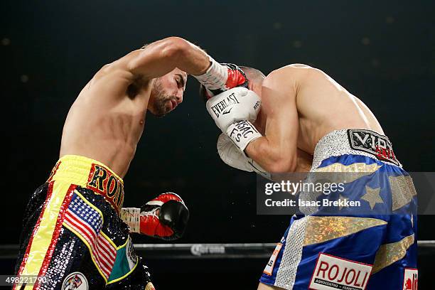 Jayson Rios Ronny Rios throws a right at Jayson Velez during their silver... News ...