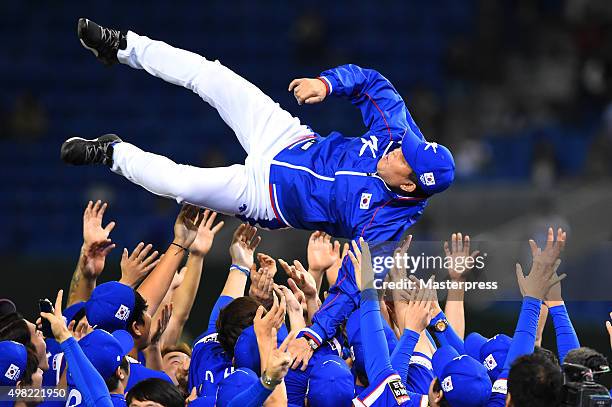 South Korea team celebrate after winning the WBSC Premier 12 final match between South Korea and the United States at the Tokyo Dome on November 21,...