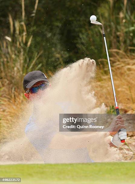 Michael Wright of Australia plays out of the bunker during the final round of the 2015 Australian Masters at Huntingdale Golf Club on November 22,...