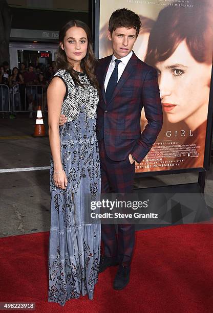 Alicia Vikander and Eddie Redmayne arrives at the Premiere Of Focus Features' "The Danish Girl" at Westwood Village Theatre on November 21, 2015 in...