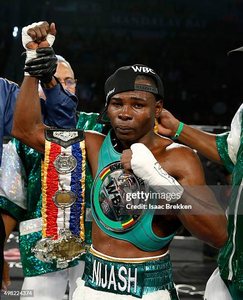 Guillermo Rigondeaux celebrates after his unanimous decision victory against Drian Francisco during their junior featherweight bout at the Mandalay...