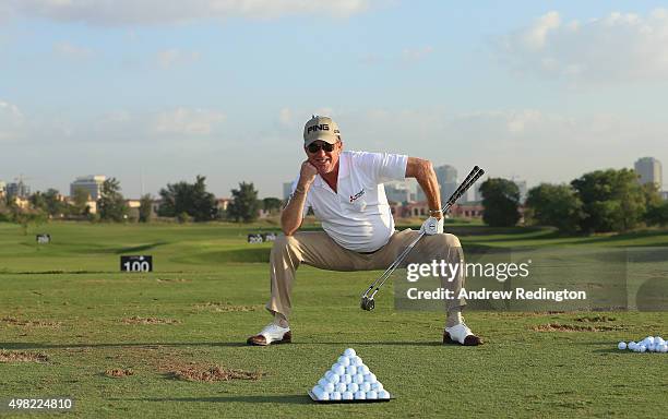 Miguel Angel Jimenez of Spain warms up on the driving range prior to teeing off in the final round of the DP World Tour Championship on the Earth...