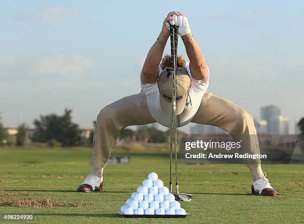 Miguel Angel Jimenez of Spain warms up on the driving range prior to teeing off in the final round of the DP World Tour Championship on the Earth...