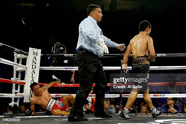 Takashi Miura knocks down Francisco Vargas in the fourth round during their WBC super featherweight title fight at the Mandalay Bay Events Center on...