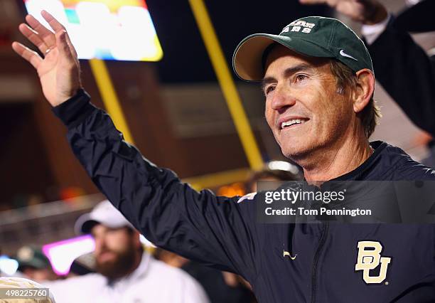 Head coach Art Briles of the Baylor Bears celebrates after the Baylor Bears beat the Oklahoma State Cowboys 45-35 at Boone Pickens Stadium on...