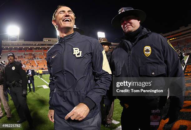 Head coach Art Briles of the Baylor Bears celebrates after the Baylor Bears beat the Oklahoma State Cowboys 45-35 at Boone Pickens Stadium on...
