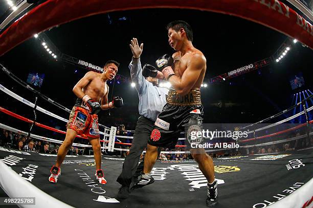 Referee Tony Weeks stops the fight in the ninth round as Francisco Vargas defeats Takashi Miura by TKO during their WBC super featherweight title...