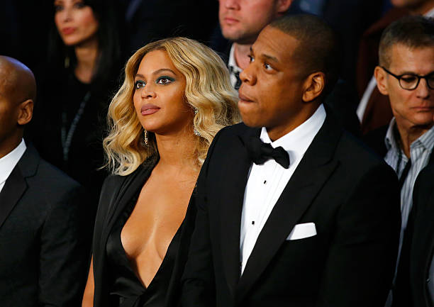Beyonce Knowles and Jay-Z look on before Miguel Cotto takes on Canelo Alvarez in their middleweight fight at the Mandalay Bay Events Center on...
