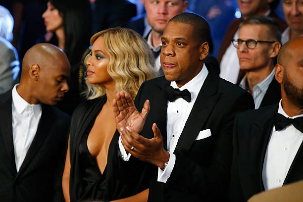 Beyonce Knowles and Jay-Z look on before Miguel Cotto takes on Canelo Alvarez in their middleweight fight at the Mandalay Bay Events Center on...
