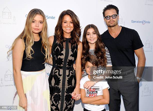 Neriah Fisher, actress Brooke Burke-Charvet, Shaya Charvet, Sierra Fisher and actor David Charvet attend the Petit Maison Chic fashion show honoring...