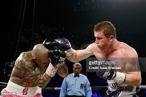 Canelo Alvarez throws a right at Miguel Cotto during their middleweight fight at the Mandalay Bay Events Center on November 21, 2015 in Las Vegas,...