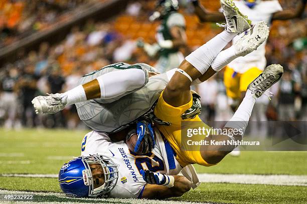 Andre Chachere of the San Jose State Spartans intercepts a pass intended for Devan Stubblefield of the Hawaii Warriors for a touchback during the...