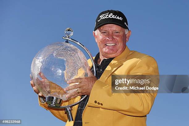 Peter Senior of Australia poses with the trophy after winning during the final round of the 2015 Australian Masters at Huntingdale Golf Club on...