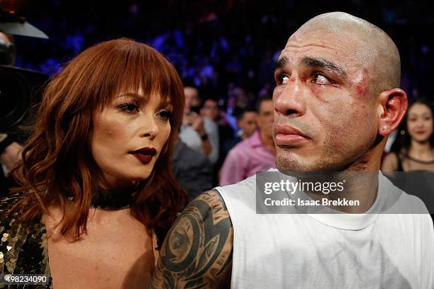 Miguel Cotto and wife Melissa Guzman react after Cotto is defeated by Canelo Alvarez by unanimous decision in their middleweight fight at the...