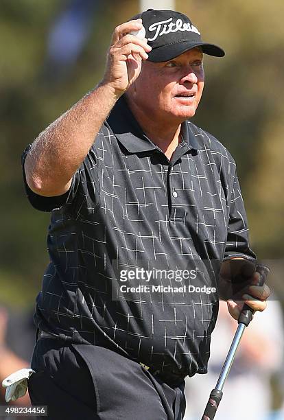 Peter Senior of Australia reacts after making a putt on the final hole during the final round of the 2015 Australian Masters at Huntingdale Golf Club...