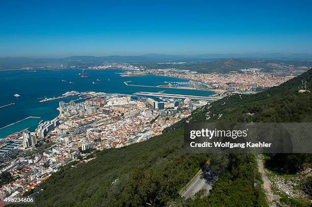 View of the port and Bay of Gibraltar from the observation platform at the top of the Rock of Gibraltar, which is a British Overseas Territory,...