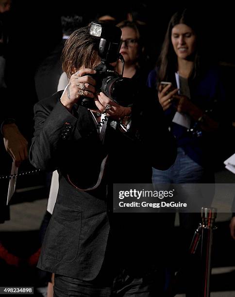 Actor Johnny Depp arrives at the premiere of Focus Features' "The Danish Girl" at Westwood Village Theatre on November 21, 2015 in Westwood,...