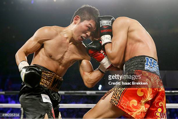 Takashi Miura throws a left to the face of Francisco Vargas during their WBC super featherweight title fight at the Mandalay Bay Events Center on...
