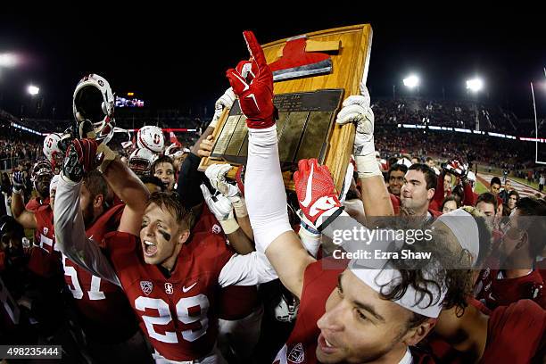 Stanford Cardinal celebrate with "The Axe" after they beat the California Golden Bears 35-22 in the Big Game at Stanford Stadium on November 21, 2015...