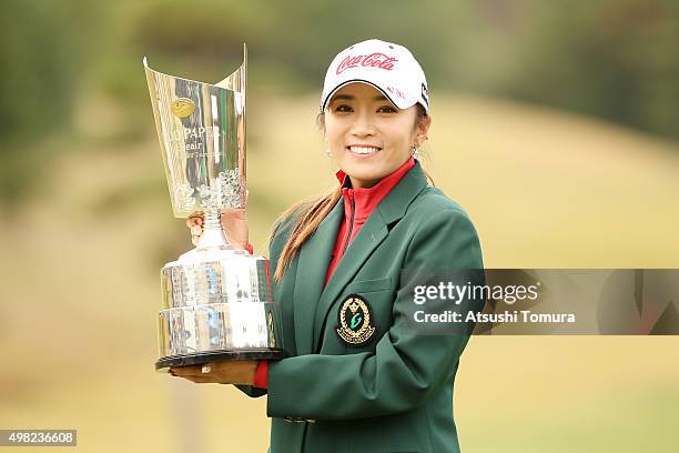 Bo-Mee Lee of South Korea poses with the trophy after winning the Daio Paper Elleair Ladies Open 2015 at the Itsuura-teien Country Club on November...