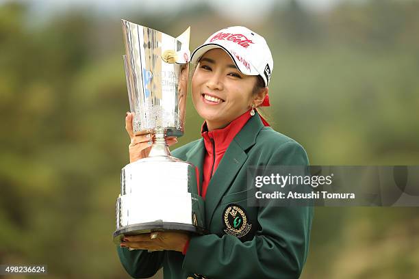 Bo-Mee Lee of South Korea poses with the trophy after winning the Daio Paper Elleair Ladies Open 2015 at the Itsuura-teien Country Club on November...