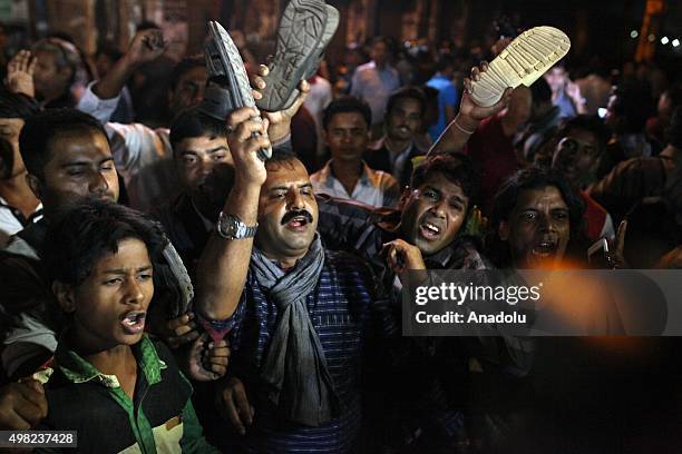 People stage against executions as they wait the Ambulances, carrying dead bodies of Salahuddin Quader Chowdhury and Ali Ahsan Muhammad Mojaheed, in...