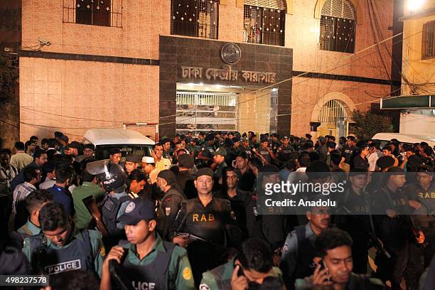 People gather as they wait the Ambulances, carrying dead bodies of Salahuddin Quader Chowdhury and Ali Ahsan Muhammad Mojaheed, in front of he jail...
