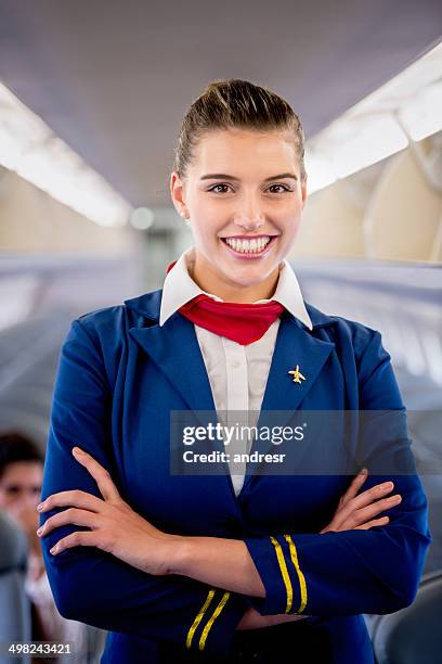 happy flight attendant - air stewardess stock pictures, royalty-free photos & images