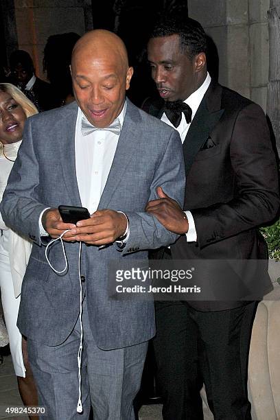 Russell Simmons and Sean 'Diddy' Combs arrive at Sean 'Diddy' Combs Exclusive Birthday Celebration on November 21, 2015 in Beverly Hills, California.