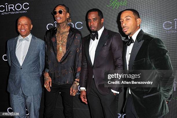 Russell Simmons and recording artists Wiz Khalifa, Sean 'Diddy' Combs, and Ludacris attends Sean "Diddy" Combs' Exclusive Birthday Celebration on...