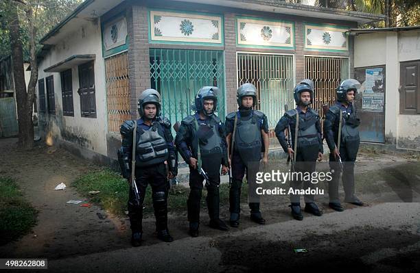 November 22: Security forces are seen in front of Jamaat e Islamis Secretary General Ali Ahsan Muhammad Mujahid's ancestral home in Faridpur,...