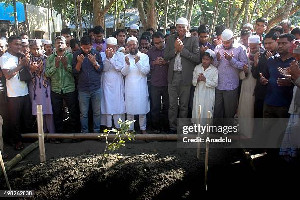 November 22: People pray during the Jamaat e Islamis Secretary General Ali Ahsan Muhammad Mujahid's burial ceremony near his ancestral home in...