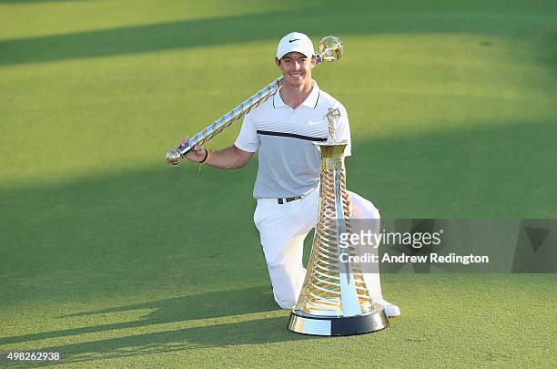 Rory McIlroy of Northern Ireland Rory McIlroy of Northern Ireland poses with the Race To Dubai and DP World Tour Championship trophies following the...