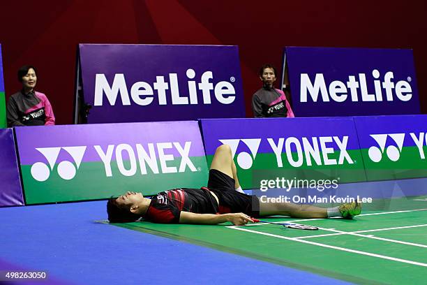 Lee Yong Dae falls on the court during the match between Yoo Yeon Seong and Lee Yong Dae of Korea and Mathias Boe and Carsten Mogensen of Denmark at...