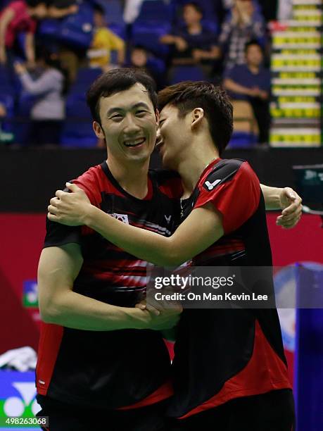 Lee Yong Dae and Yoo Yeon Seong of Korea reacts after the match between Yoo Yeon Seong and Lee Yong Dae and Mathias Boe and Carsten Mogensen of...