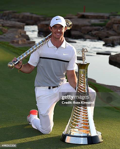 Rory McIlroy of Northern Ireland with the DP World Tour Championship Trophy and the Race to Dubai Trophy after the final round of the DP World Tour...