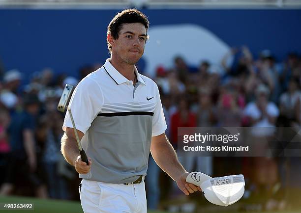 Rory McIlroy of Northern Ireland celebrates on the 18th green during the final round of the DP World Tour Championship on the Earth Course at...