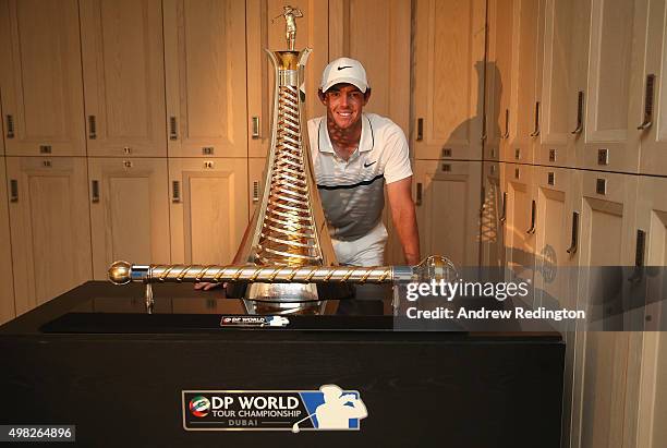 Rory McIlroy of Northern Ireland Rory McIlroy of Northern Ireland poses with the Race To Dubai and DP World Tour Championship trophies in the locker...