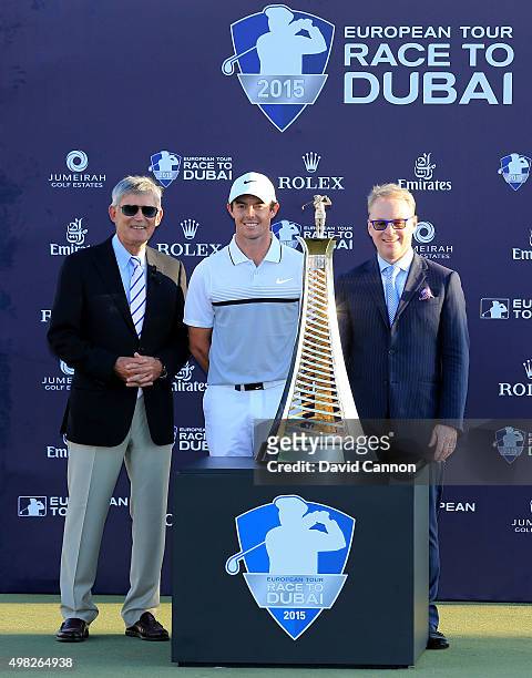 Rory McIlroy of Northern Ireland poses with Keith Pelley the Chief Executive of the European Tour and David Williams The Chairman of the European...