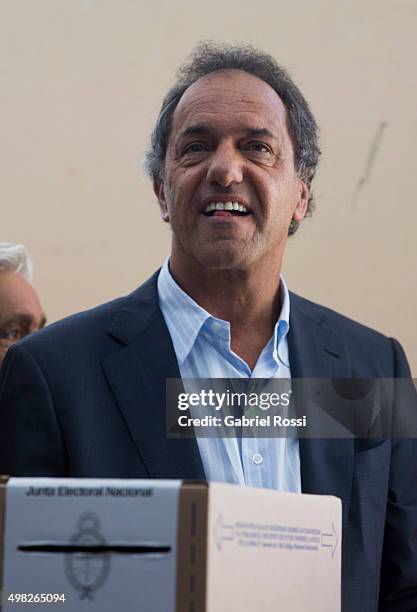 Daniel Scioli Presidential Candidate for Frente Para La Victoria gestures before casting his vote during runoff elections on November 22, 2015 in...