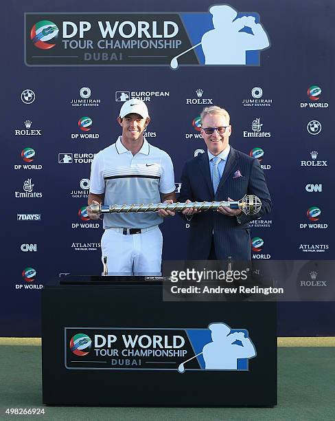 Rory McIlroy of Northern Ireland and Keith Pelley, Chief Executive of The European Tour, are pictured together with the DP World Tour Championship...