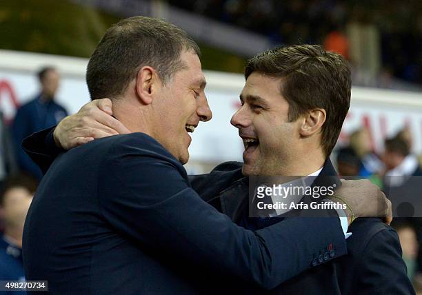 West Ham United manager, Slaven Bilic greets Mauricio Pochettino prior to the Barclays Premier League match between Tottenham Hotspur and West Ham...