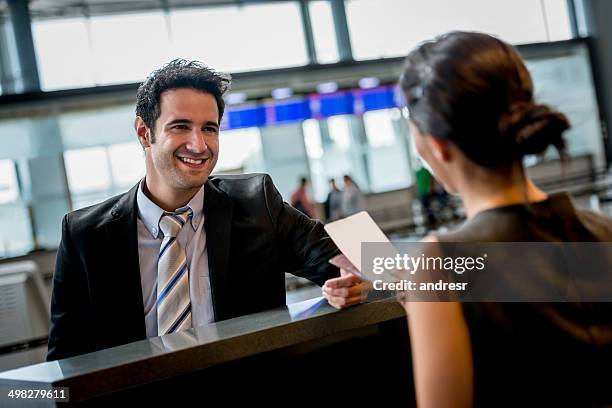 business man doing check-in - airline ticket counter stock pictures, royalty-free photos & images